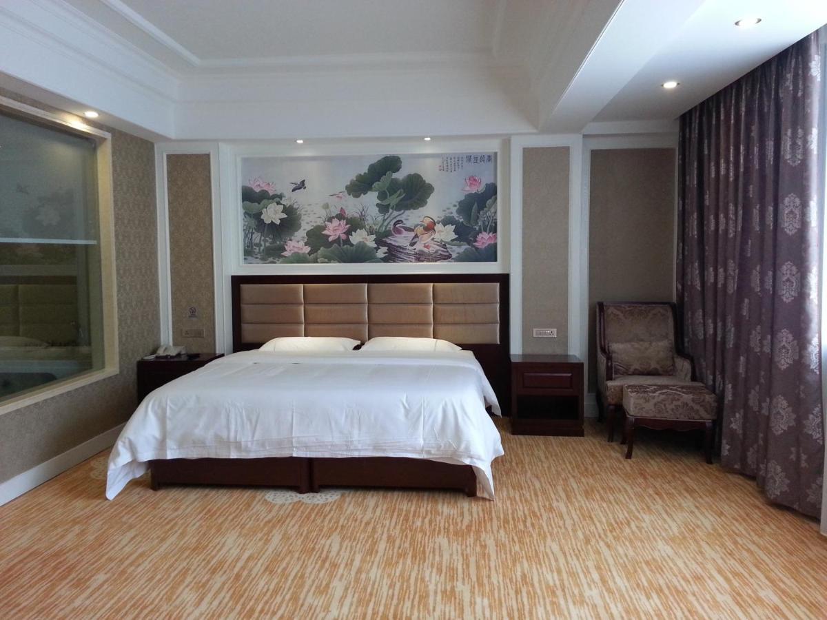 New West Street Hotel - Grand Wing หยางซั่ว ห้อง รูปภาพ