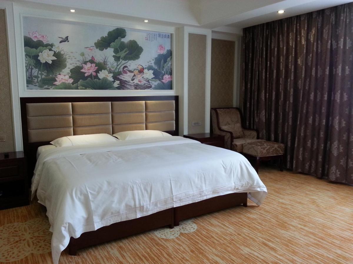 New West Street Hotel - Grand Wing หยางซั่ว ห้อง รูปภาพ