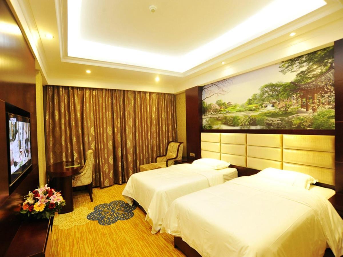 New West Street Hotel - Grand Wing หยางซั่ว ห้อง รูปภาพ